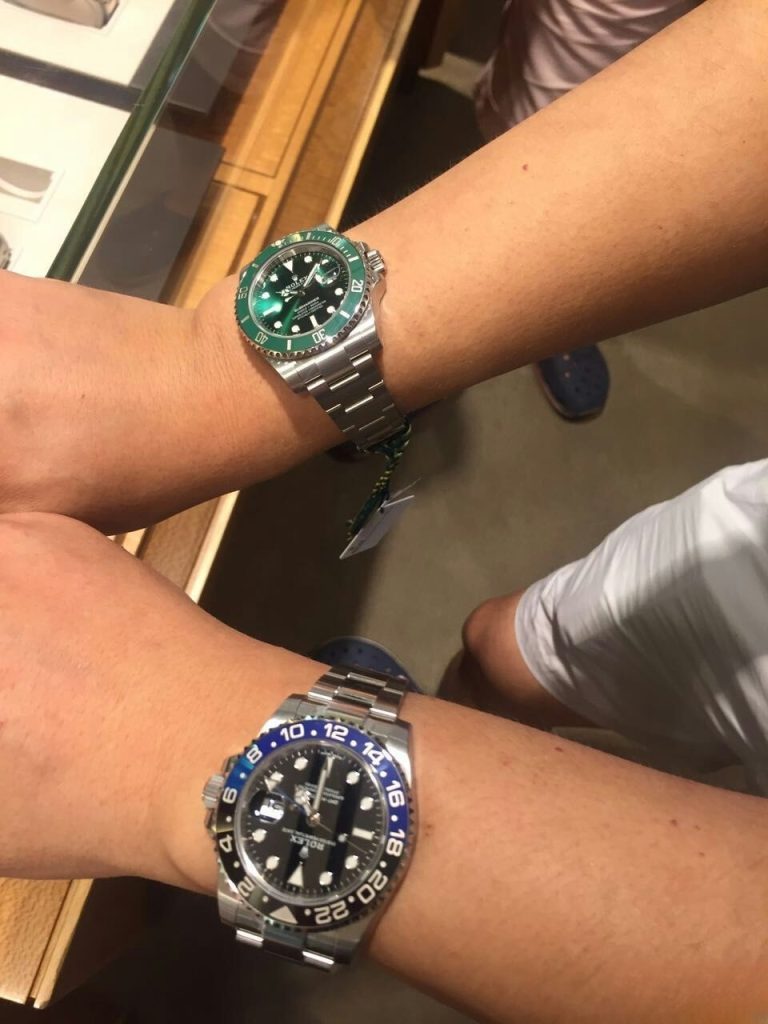 replica rolex green dial vs black dial