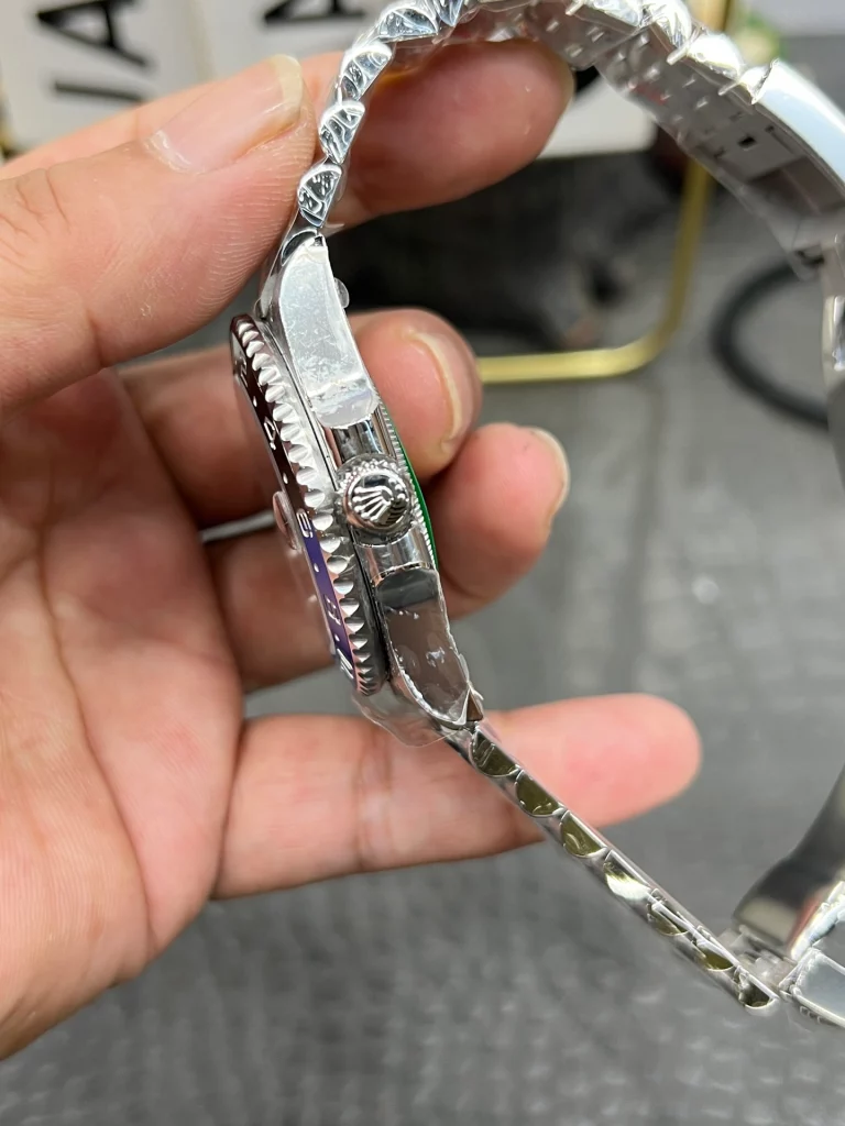 Side profile of a watch case showing crown size, bezel edge, and case thickness