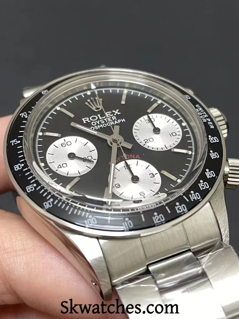 angled close-up of watch dial showing alignment and printing details