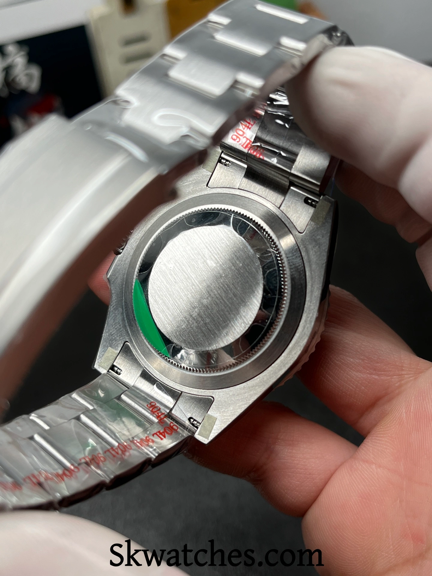 Caseback and lug fitment on a Rolex replica, showing bracelet connection and finishing details