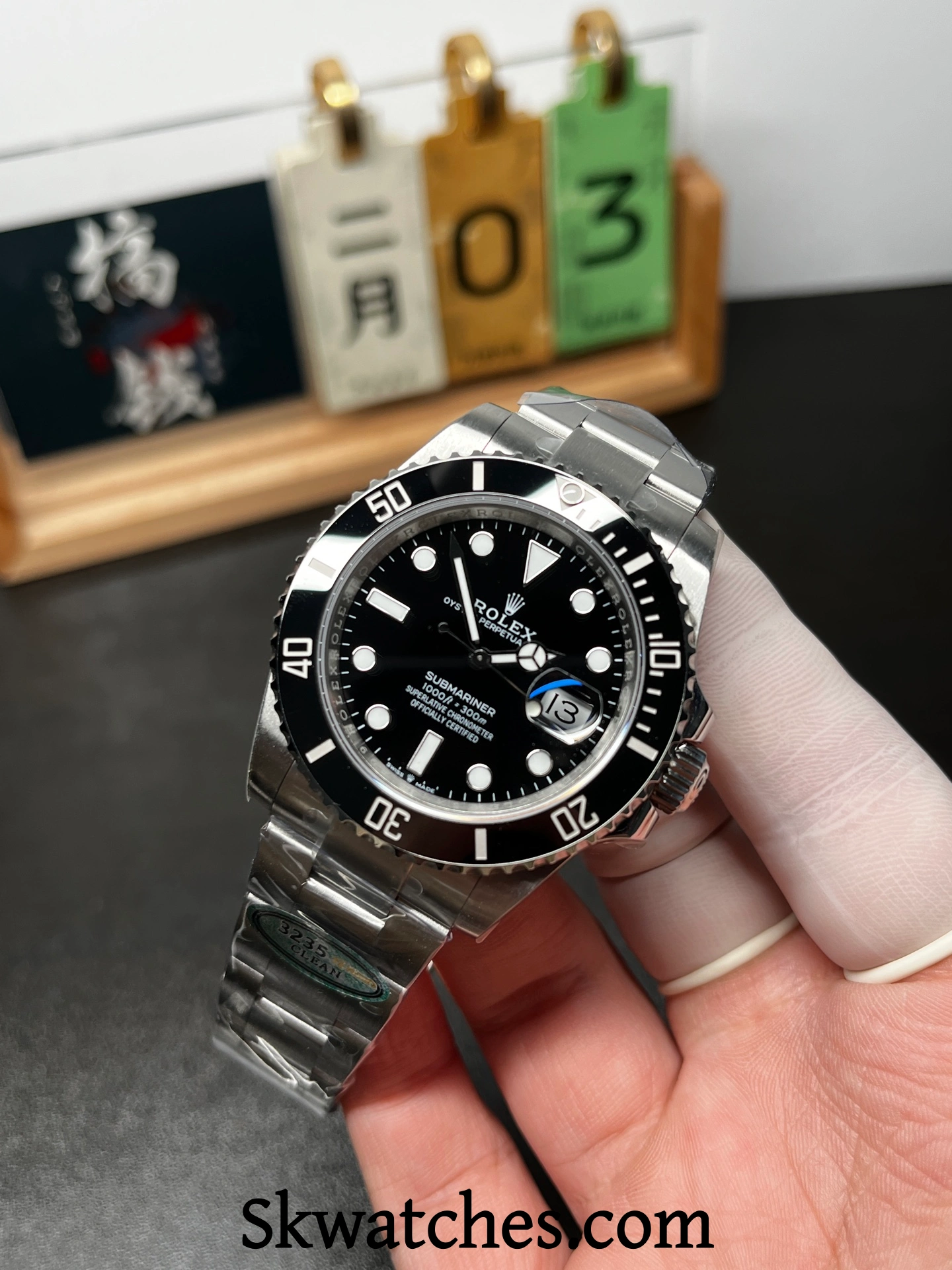Angled view of a Rolex Submariner replica highlighting bezel teeth, case geometry, and dial clarity